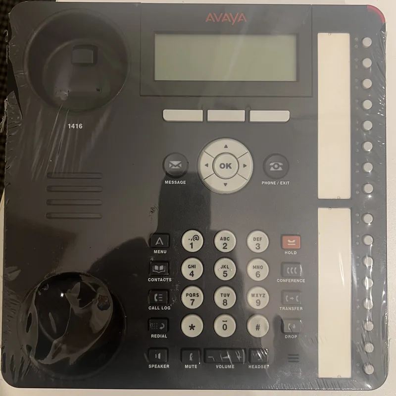 An Avaya 1416 handset still sealed in its plastic wrap