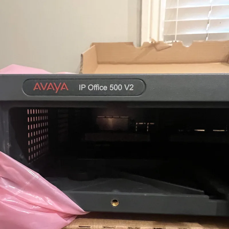 A new Avaya IP Office 500 V2 control unit half out of its anti-static bag