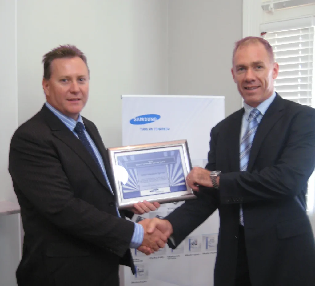 Graeme Hathway accepting the 2010 Samsung Highly Commended Sales Award for Cititel Telephone Systems