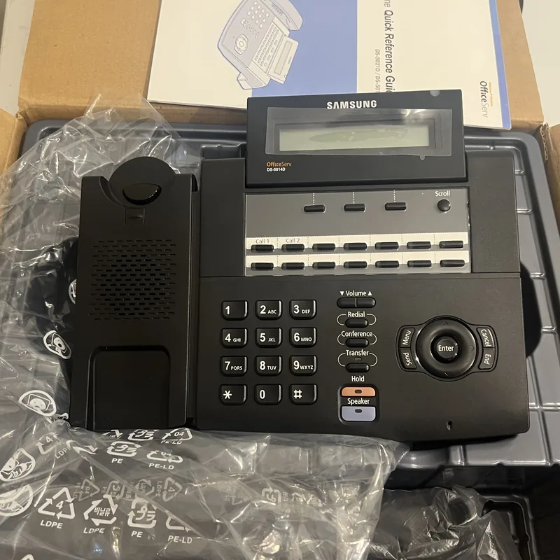 A new Samsung OfficeServ DS-5014D handset in its packing tray